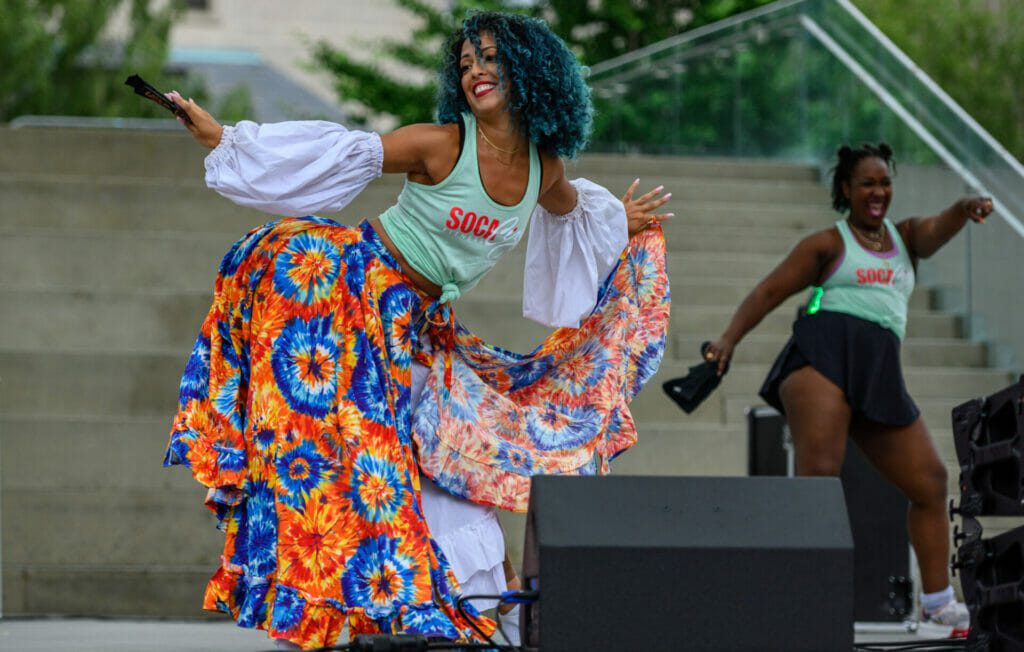 Fitness dancer performing an energetic routine at the Toronto Caribbean Carnival 2023.